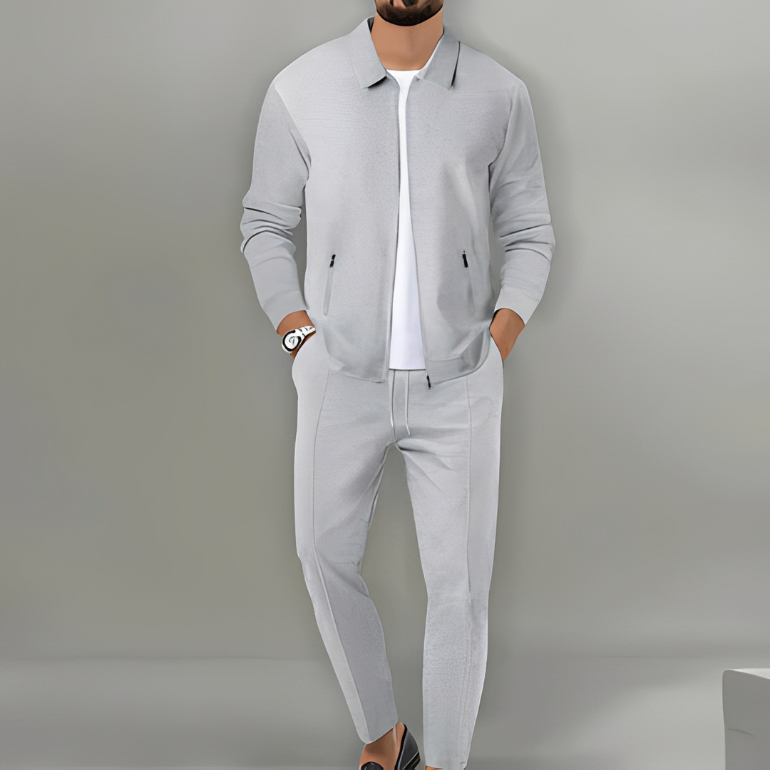 Fashionable men's zip-up tracksuit set. Modern casual two-piece jacket & pants for style & comfort.