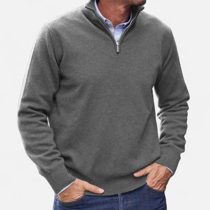 Versatile men's zipper knit sweater for layering. Refined, comfortable, and modern long-sleeve pullover.