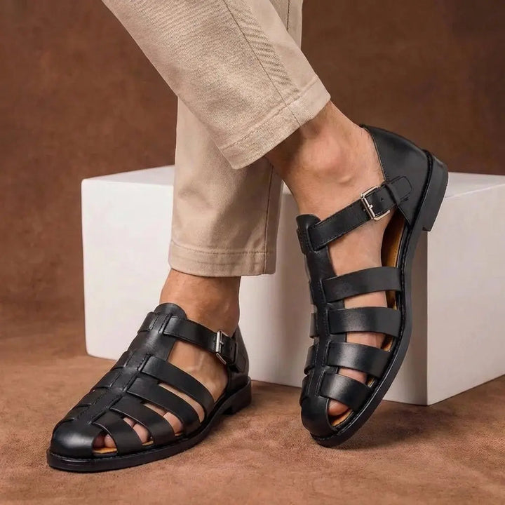 Men's summer footwear: closed toe fisherman sandals with a secure buckle strap, providing foot protection.
