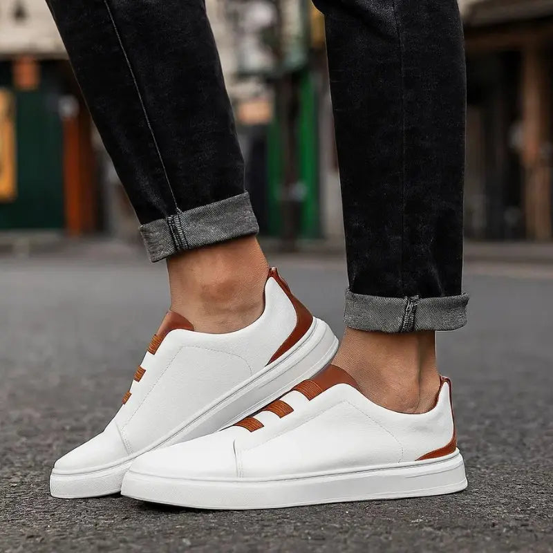 Modern men's slip-on trainers, versatile for smart casual wear, featuring athletic-inspired design & elastic laces.