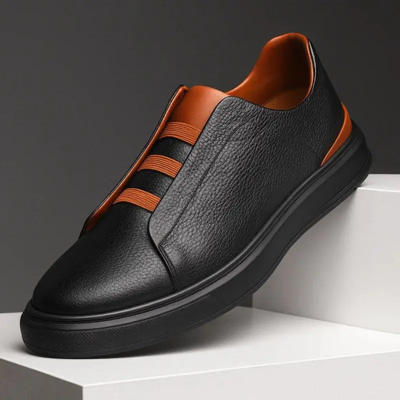 Stylish men's slip-on trainers with secure loop lacing, ideal for casual wear & comfortable everyday footwear.