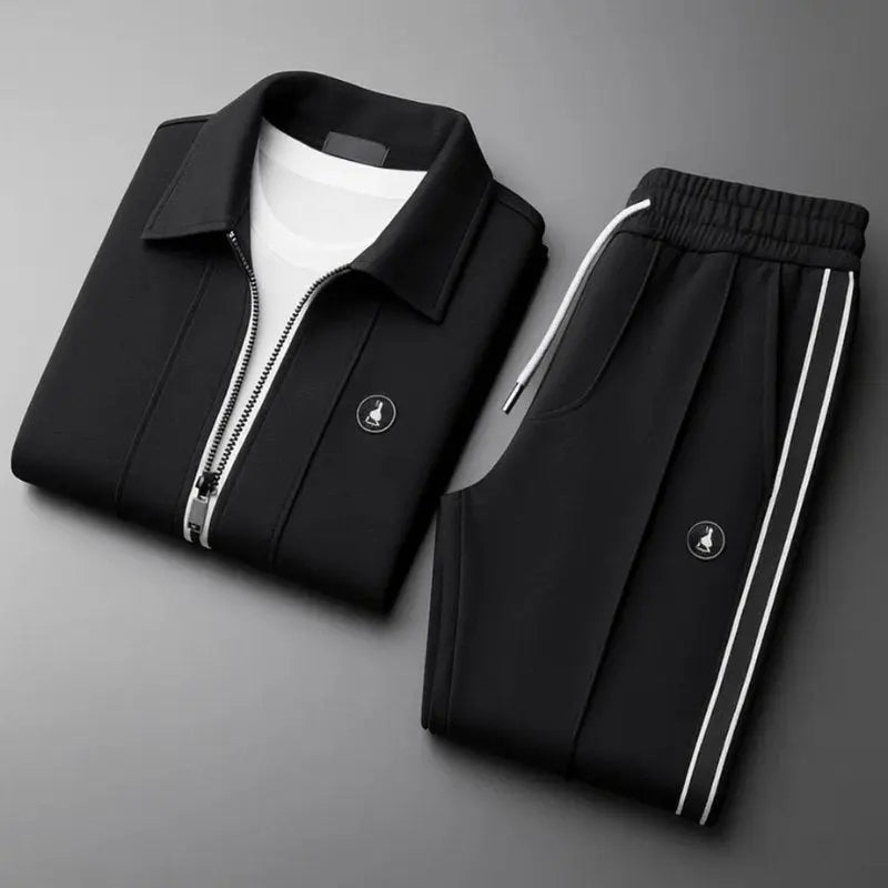Comfortable men's tracksuit set with a modern zip-up jacket and matching joggers, ideal for lounge or activewear.