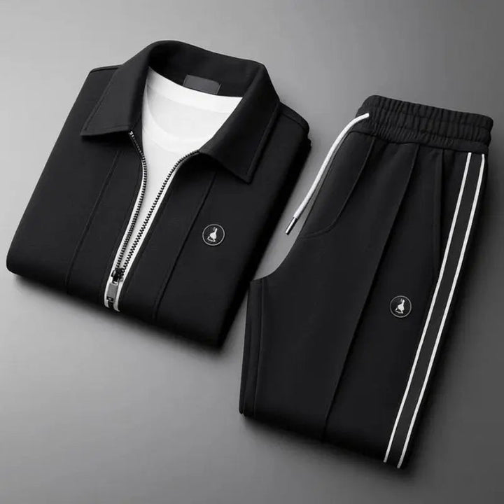 Comfortable men's tracksuit set with a modern zip-up jacket and matching joggers, ideal for lounge or activewear.