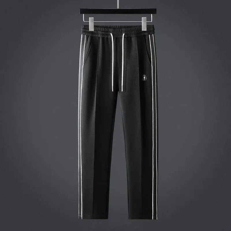 Men's coordinated activewear set: full-zip jacket & performance joggers for workouts, travel, or daily comfort.