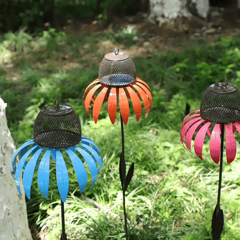 Decorative metal flower bird feeder, a stylish garden accessory for attracting wild birds. Weather-resistant & durable.