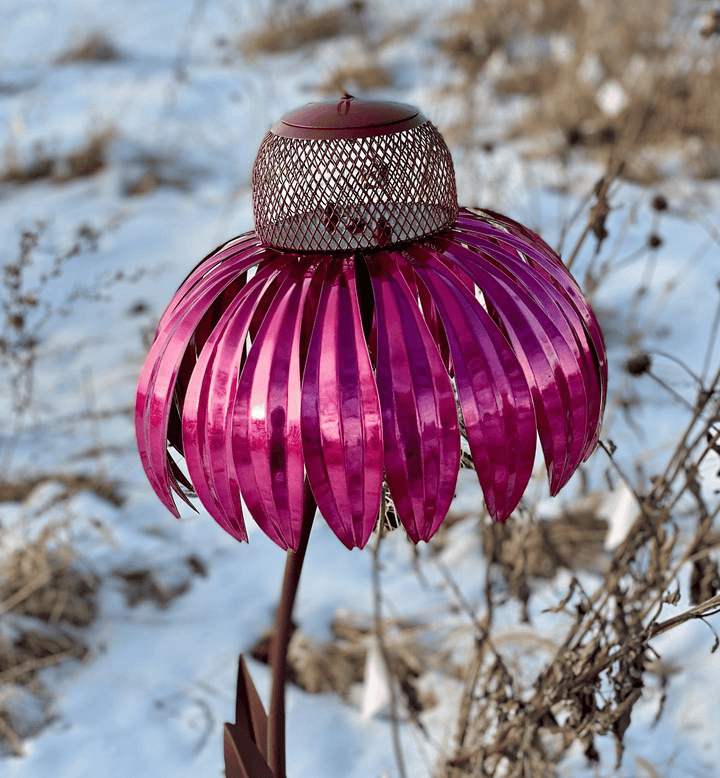 Stylish metal flower design bird feeder, enhances garden decor & provides food for wild birds. Weather-resistant.