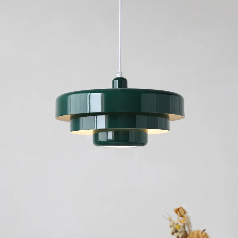 "Mid-century industrial pendant light, vibrant colors, sleek design; perfect for modern interiors, dining rooms, and offices.