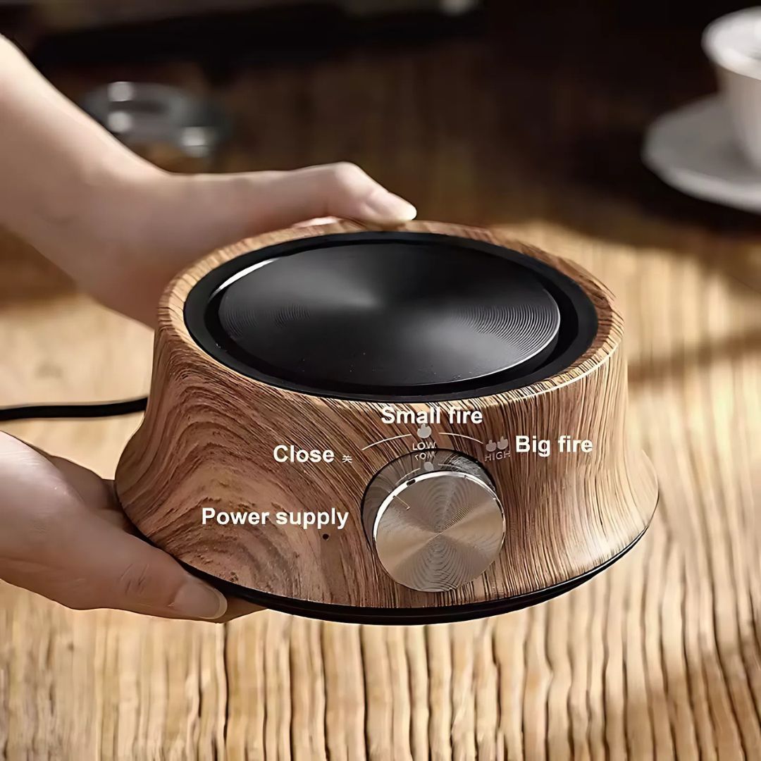 Dorm essential: Mini electric hot plate with adjustable temperature control for easy dorm cooking.