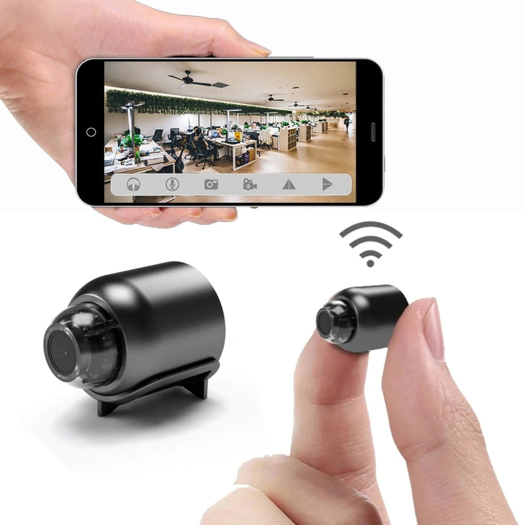 Mini Wi-Fi security camera with HD night vision for discreet home surveillance & mobile monitoring.