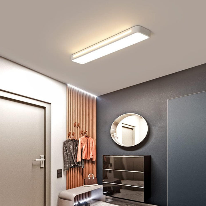 Minimalist LED long ceiling fixture, providing modern and efficient room lighting.