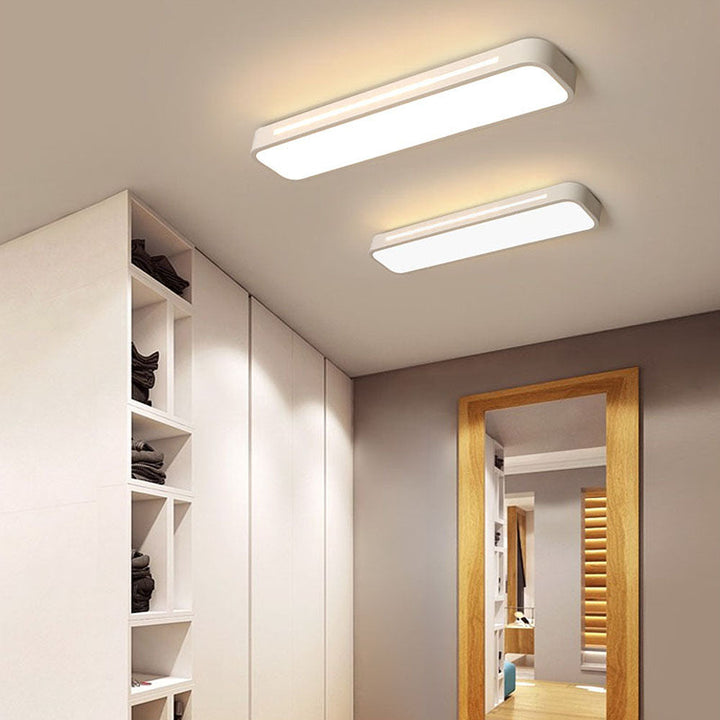 Elegant long LED ceiling lamp, offering bright, modern illumination for upscale spaces.