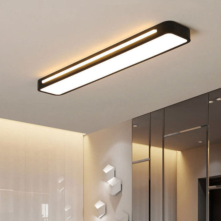 Energy-saving long LED ceiling lamp, providing bright, modern illumination for any space.