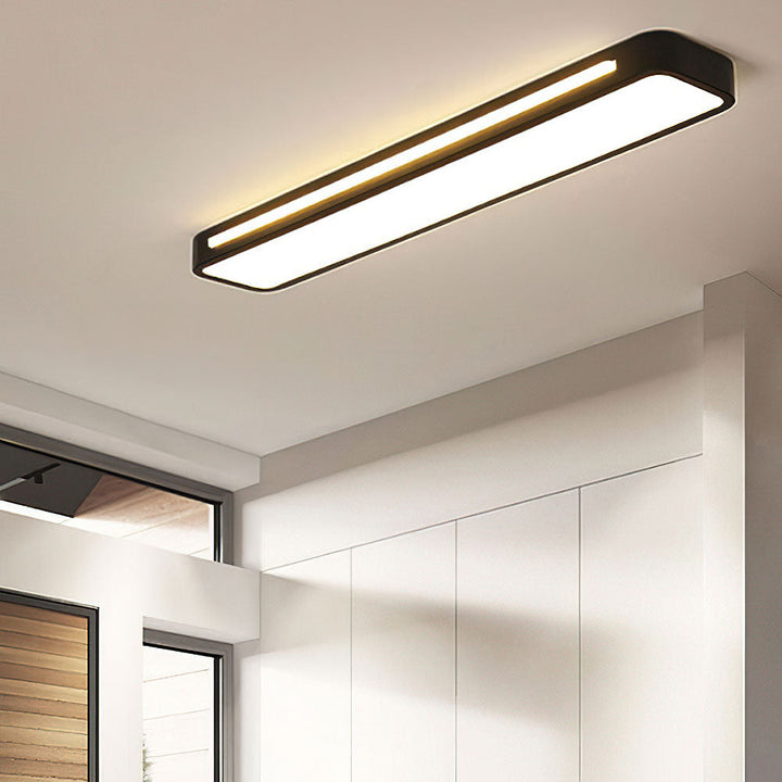 Modern long LED ceiling light, enhancing minimalist decor in any home or office.