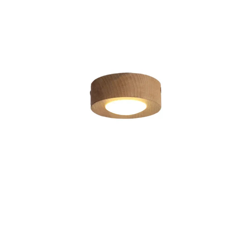 Energy-efficient LED ceiling light with a round walnut wood design, providing warm ambient light for any room.