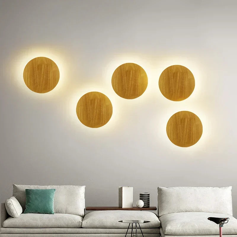 Wooden wall lamp with minimalist Scandinavian design. Provides warm ambient light, ideal for modern home decor.