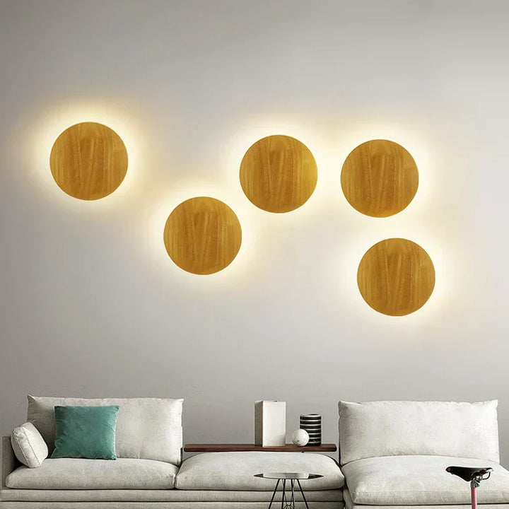 Wooden wall lamp with minimalist Scandinavian design. Provides warm ambient light, ideal for modern home decor.