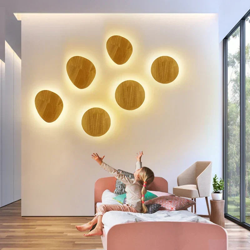 Natural wood Scandinavian wall lamp. Minimalist design, ambient lighting, adds warmth to any modern home decor.