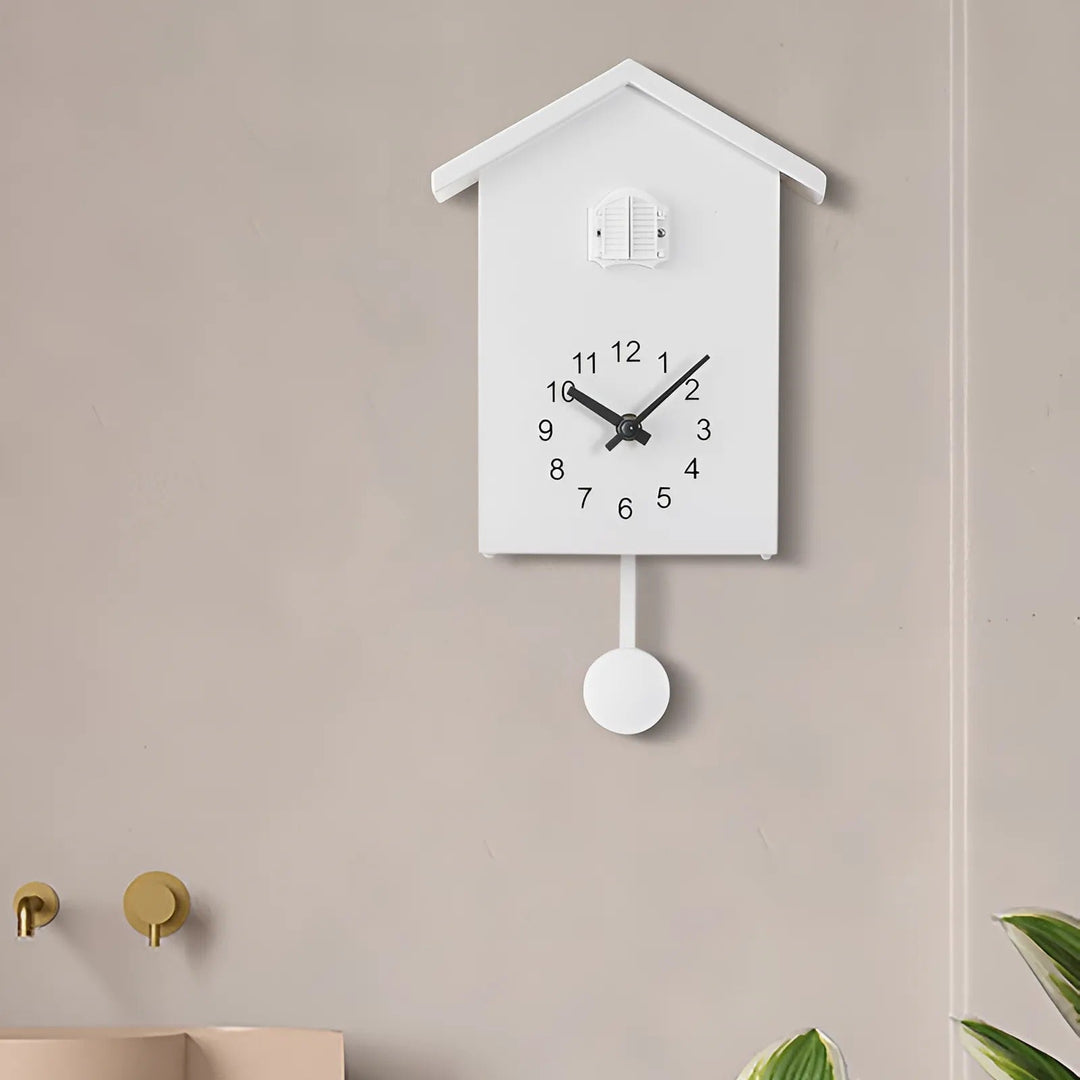 Modern cuckoo wall clock. Sleek, minimalist design, perfect for contemporary home & office decor. Unique time accent.
