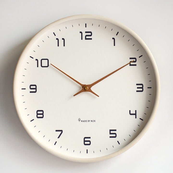 Minimalist wooden frame wall clock with silent mechanism, perfect for modern home decor.