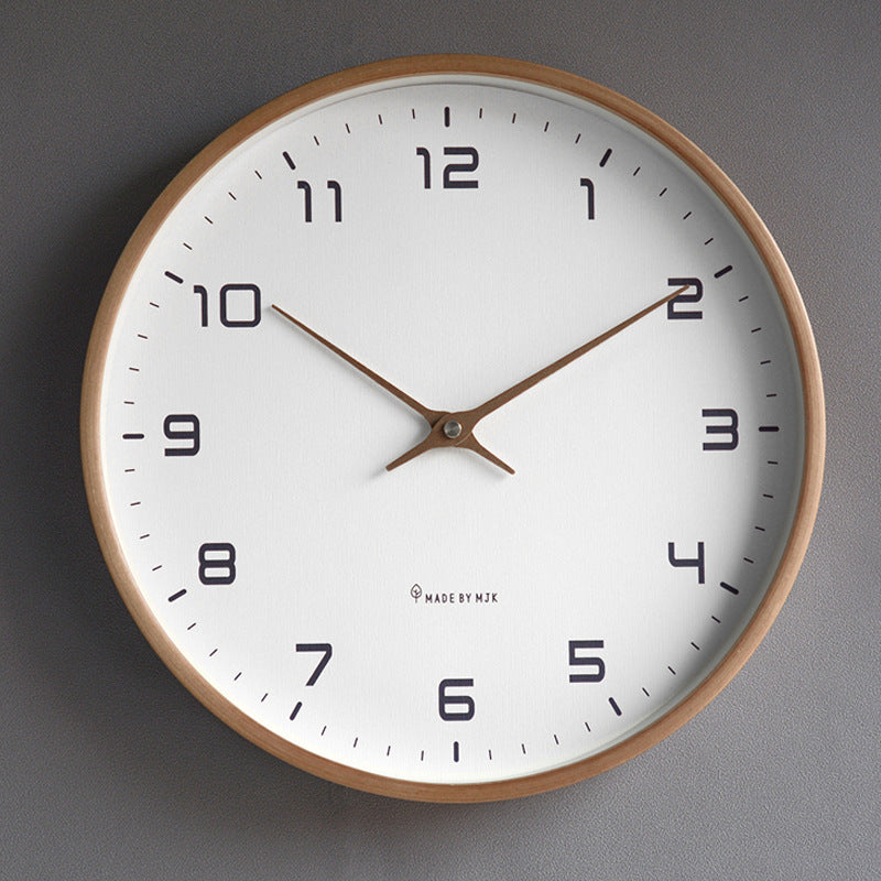 Stylish round wall clock featuring a natural wooden frame & clear glass, ideal for contemporary spaces.
