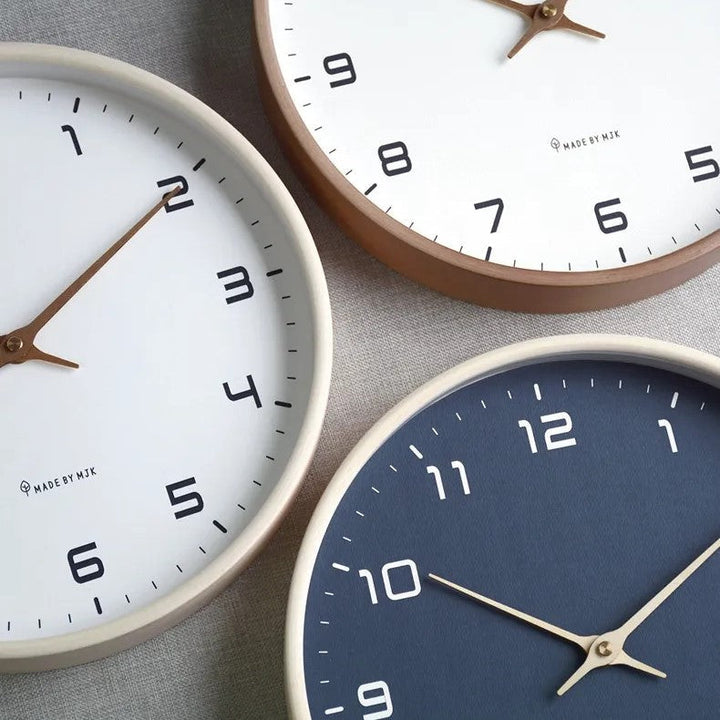 Contemporary wooden minimalist wall clock with a clear face, enhancing any modern home interior.