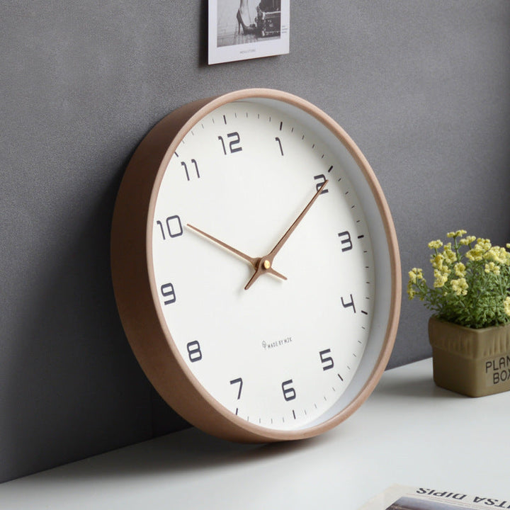 Chic wooden frame silent wall clock, a perfect housewarming gift for minimalist or modern decor lovers.