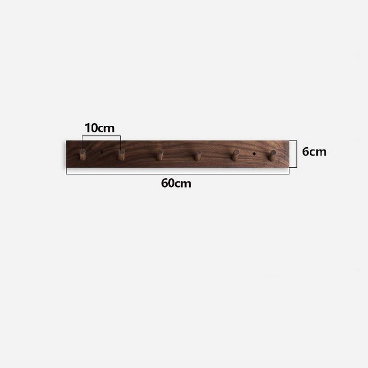 Modern minimalist wooden wall coat rack for clutter-free home organization, walnut or beech wood.