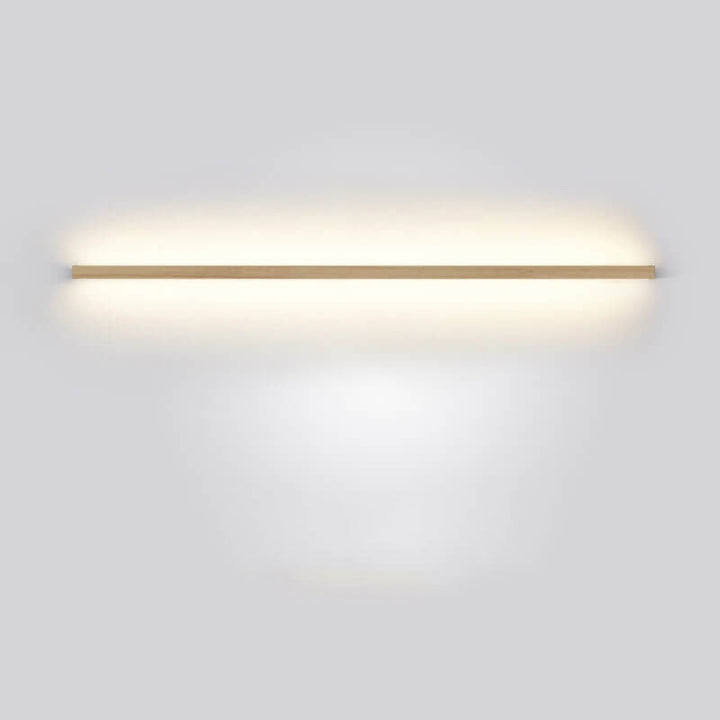 Light wood minimalist wall lamp, enhancing home decor with atmospheric LED lighting.