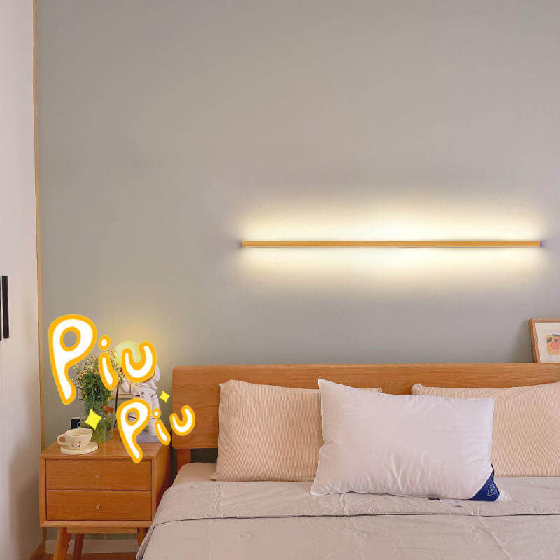 Simple wooden wall lamp with integrated LED, offering a clean look and soft ambient glow.