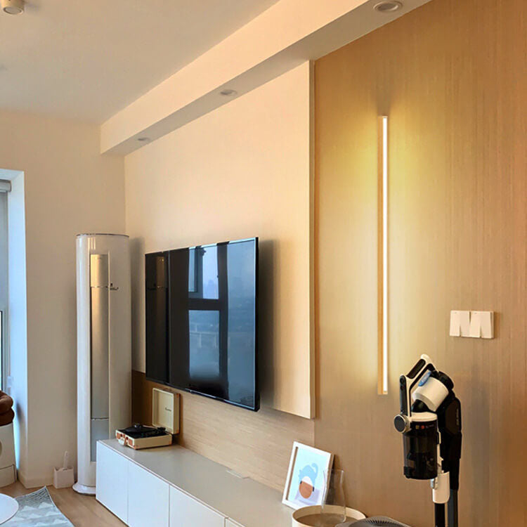 Stylish wooden wall light, providing warm LED ambient light for contemporary interior design.