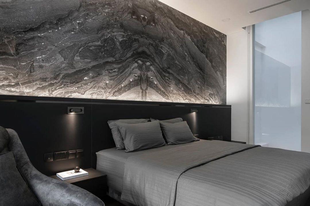 Flexible LED task lighting, wall-mounted for modern bedroom decor.
