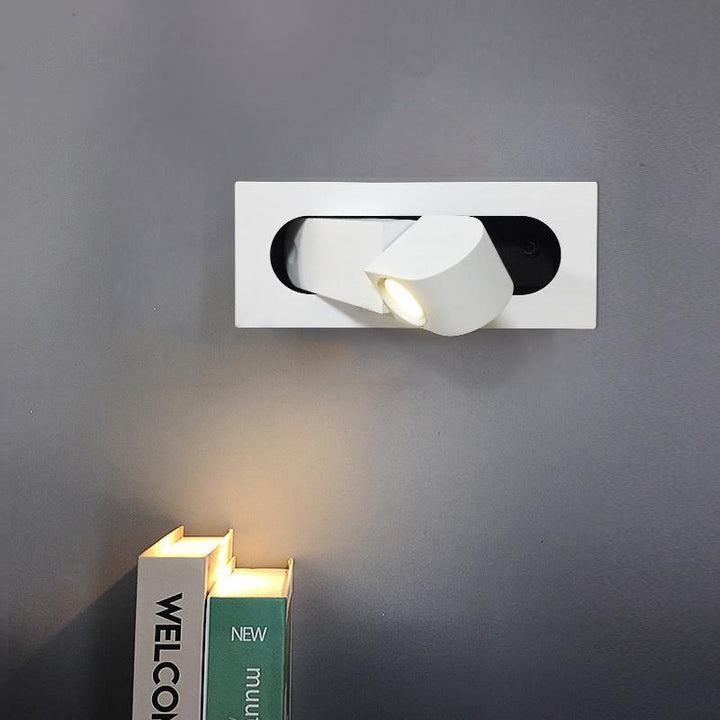 Modern adjustable LED wall lamp, ideal for focused reading in any room.