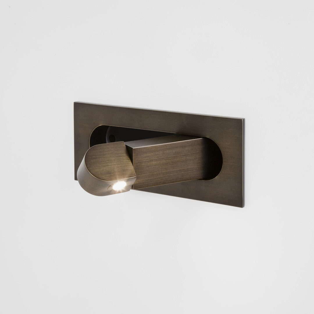 Modern LED wall light, cool light option for bright, focused reading.