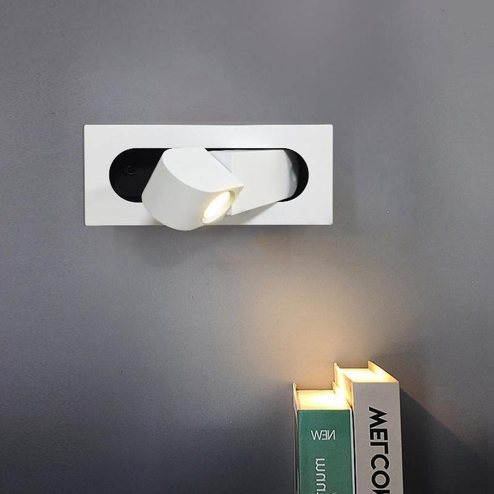 Sleek adjustable LED wall light, perfect for bedside reading & modern decor.