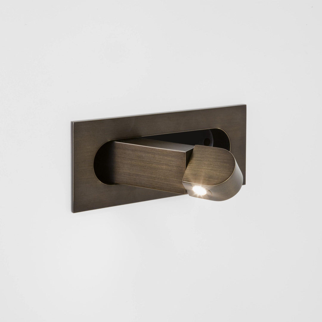 Sleek adjustable LED wall lamp, perfect for contemporary bedroom decor.