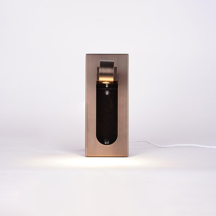 Modern adjustable LED wall lamp for precise, comfortable reading at night.