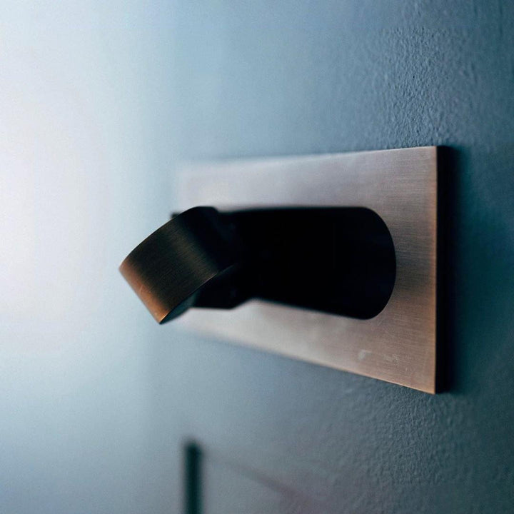 Cool light modern LED wall lamp, flexible for precise task lighting.