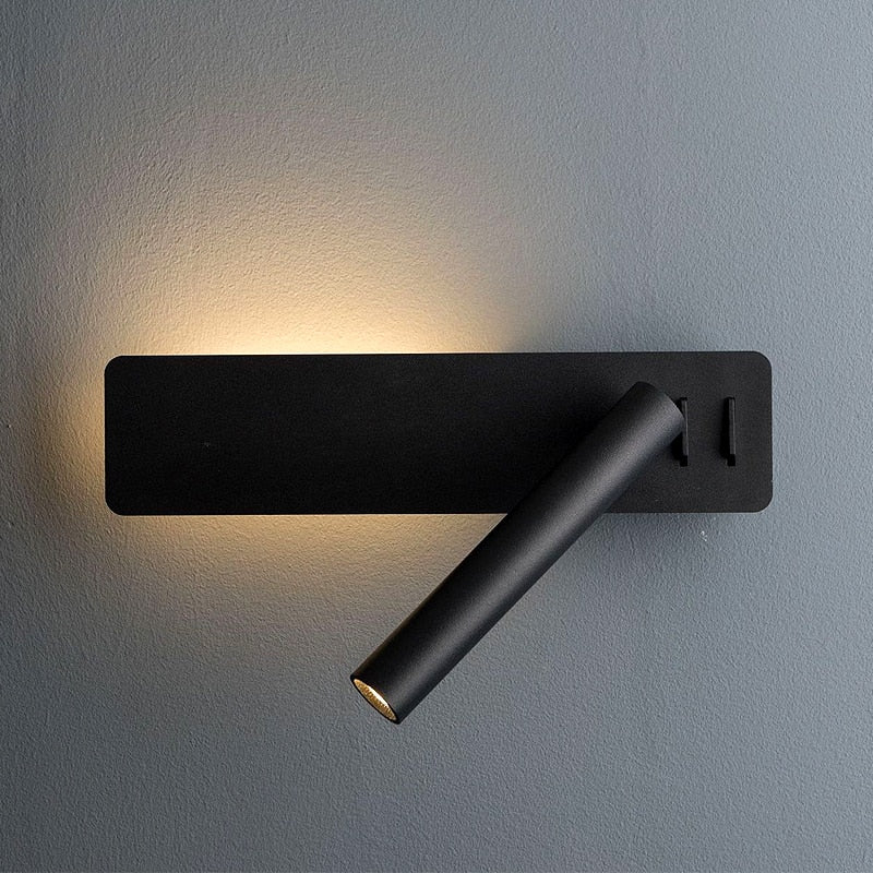 Sleek adjustable LED wall lamp, perfect for focused reading light by the bed. Modern minimalist wall-mounted design.