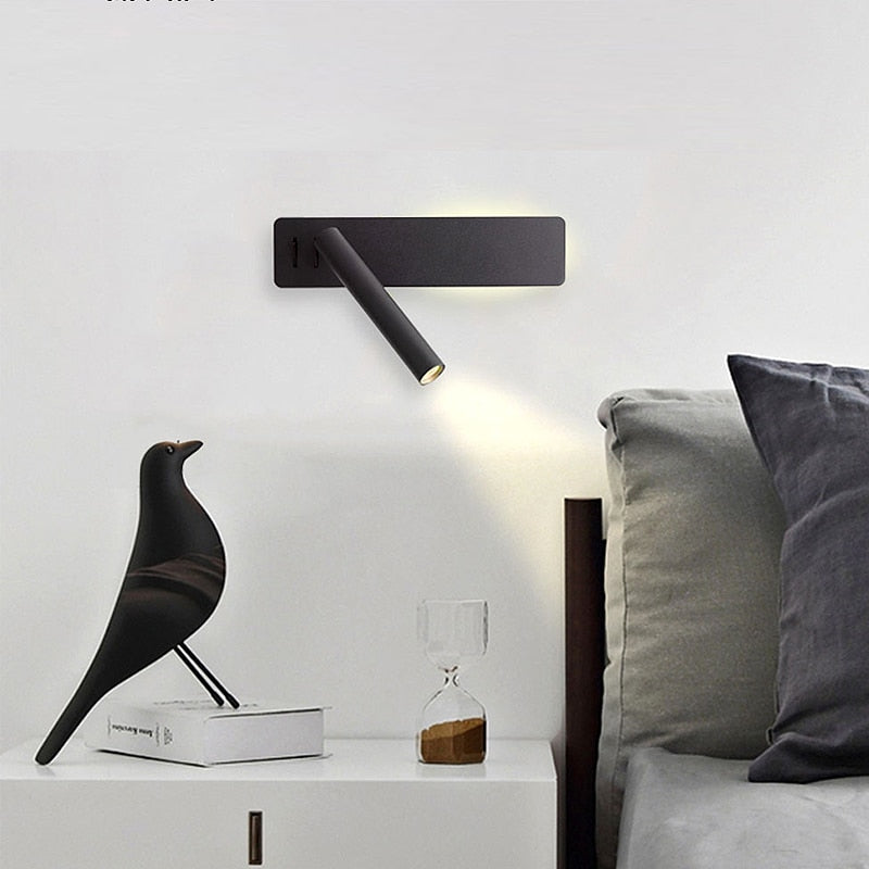 Adjustable LED wall-mounted reading light for bedroom. Provides focused task lighting, modern minimalist design.