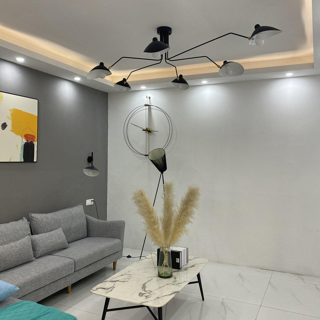 Modern adjustable multi-arm ceiling light, a designer fixture for stylish homes.