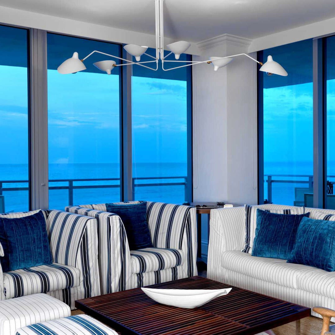 Flexible multi-arm ceiling light, offering adjustable illumination for living spaces.