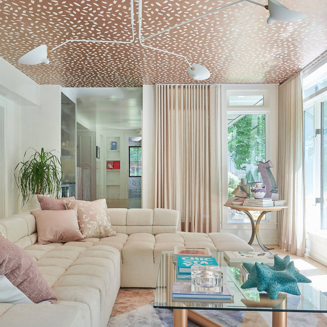 Minimalist adjustable multi-arm ceiling lamp, ideal for modern home decor.