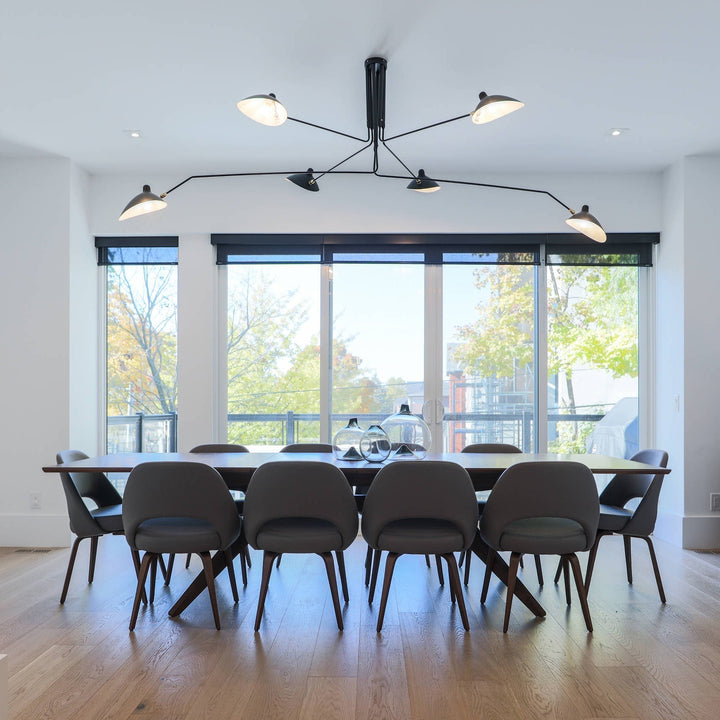 Contemporary multi-arm ceiling light, with adjustable arms for perfect lighting.