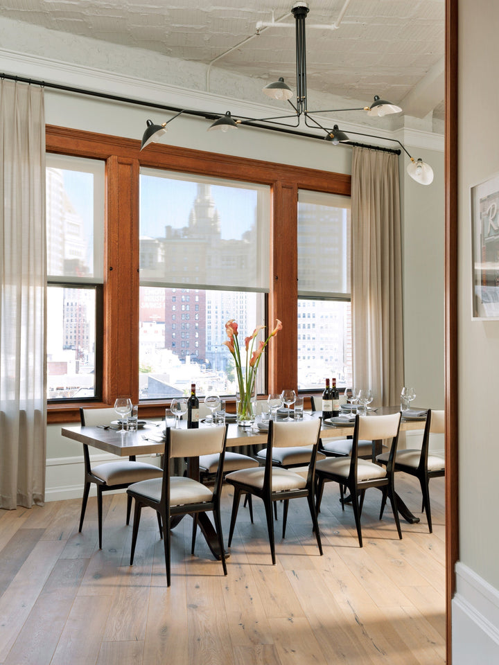 Contemporary adjustable multi-arm ceiling light, ideal for versatile lighting.
