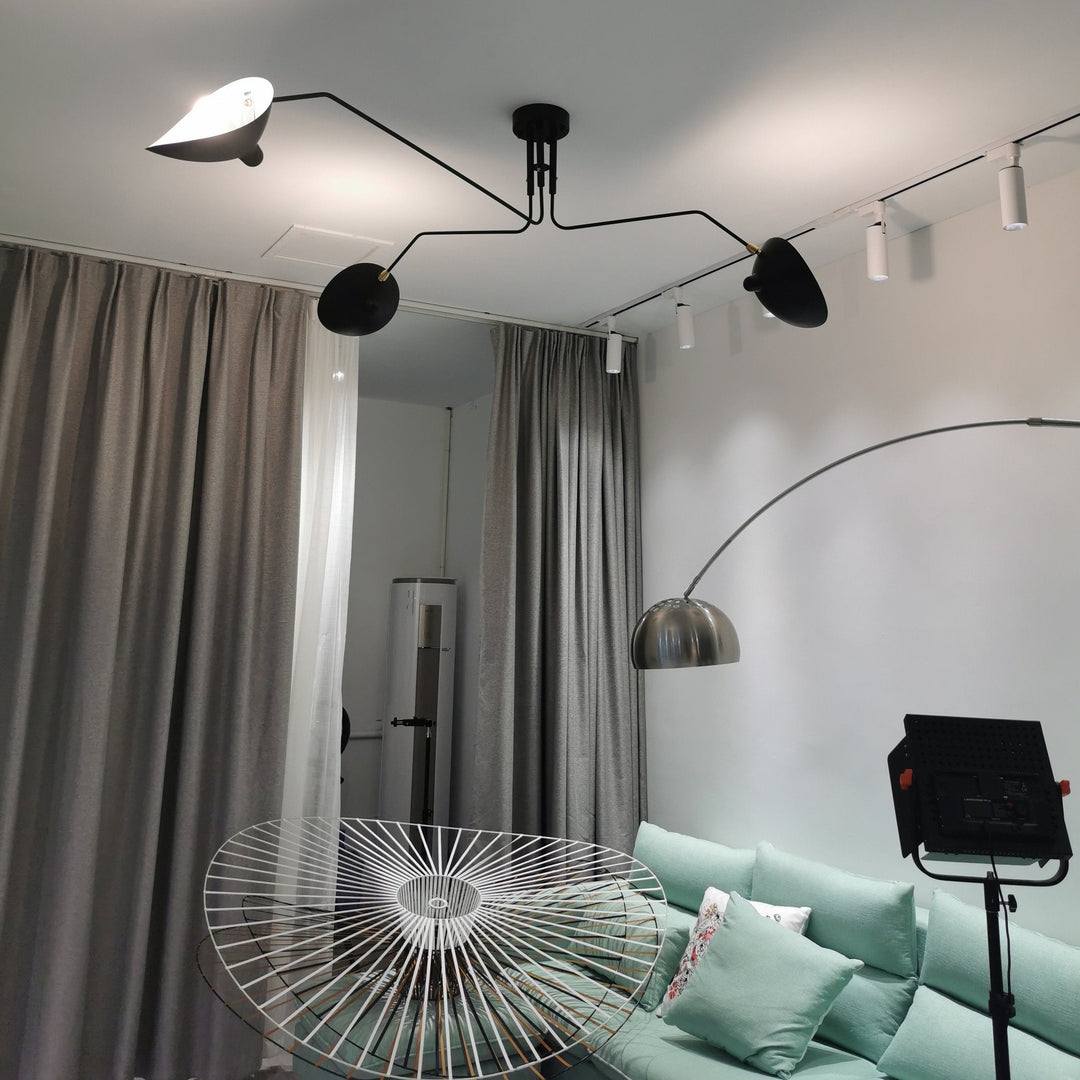 Modern multi-arm ceiling light with adjustable positions, for ultimate flexibility.