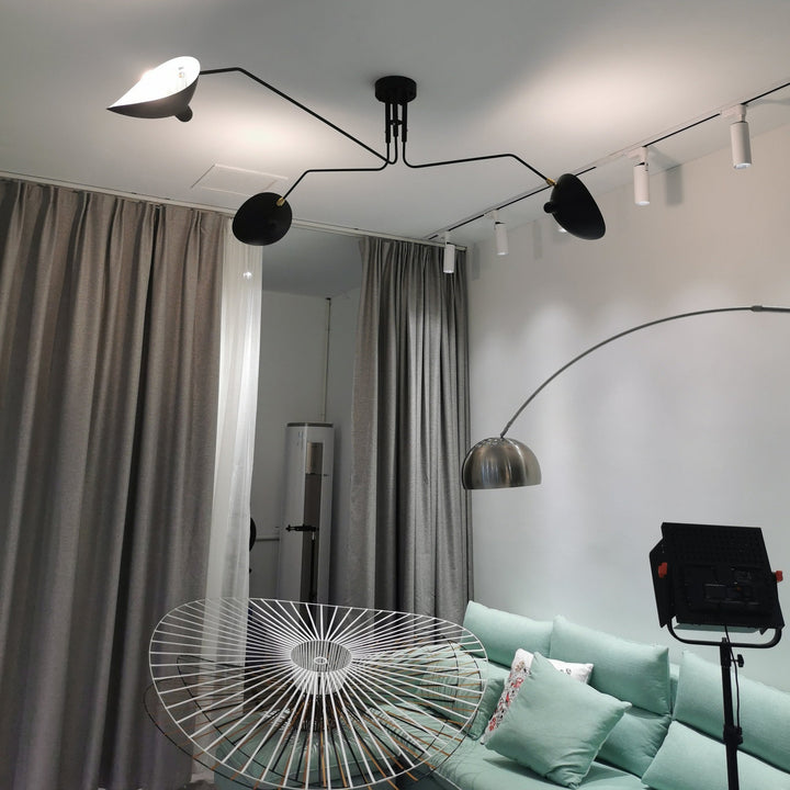 Modern multi-arm ceiling light with adjustable positions, for ultimate flexibility.