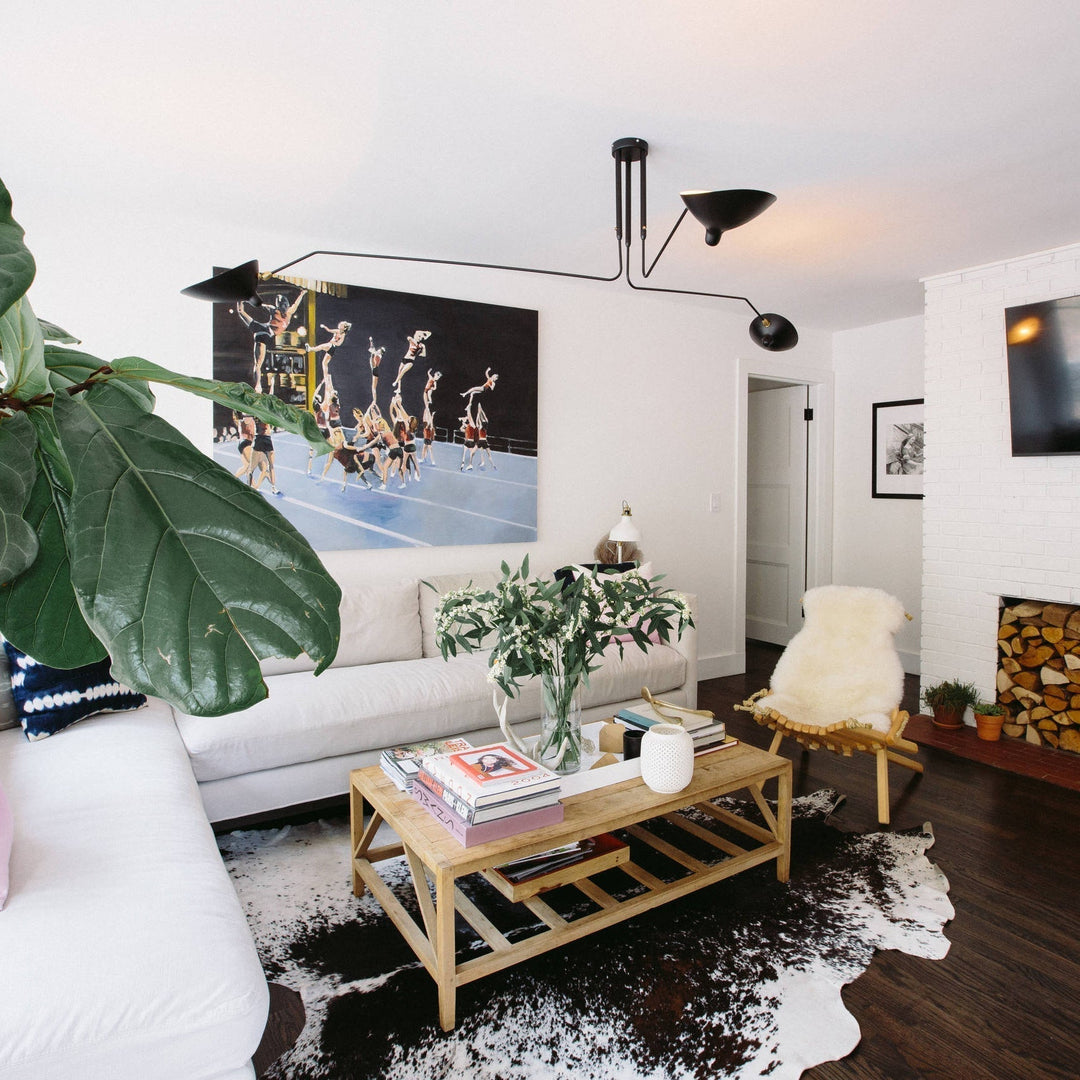 Contemporary multi-arm ceiling lamp, offering flexible lighting for any room.