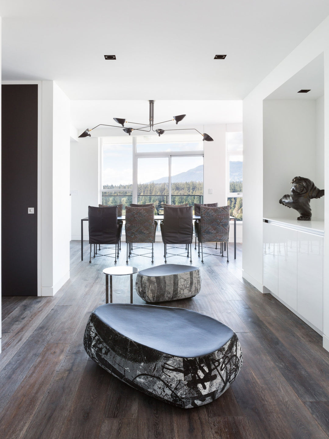 Designer multi-arm adjustable ceiling lamp, for contemporary interior design.