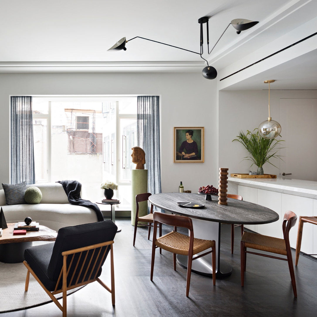 Designer multi-arm ceiling lamp, adjustable for personalized home lighting.