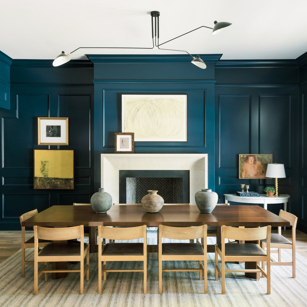 Adjustable multi-arm ceiling light, a minimalist fixture for modern spaces.